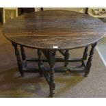 A Jacobean Revival Oak Gateleg Supper Table, circa 19th century, Having drop ends, drawer to one