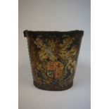 A Painted Leather Fire Bucket, circa 19th century, Painted with the British coat of arms, 25cm high,