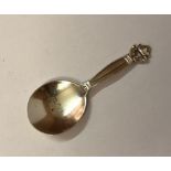 Georg Jensen, A Danish Silver Acorn Pattern Caddy Spoon, circa 1930s, stamped 925, GI, and GS,