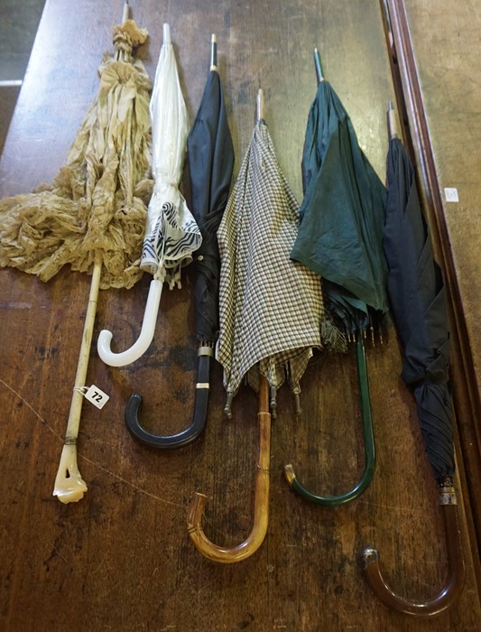 Six Assorted Parasols / Umbrellas, circa early 20th century and later, to include a lace example