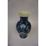 A Chinese Blue and White Pottery Vase, Late Qing Dynasty, of baluster form, decorated with panels of