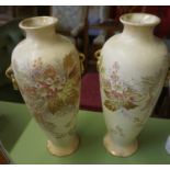 A Pair of Royal Bonn Vases, Decorated with applied floral panels on a blush ivory ground, 35cm high,