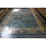 A Large Chinese Carpet, circa 1920s, Decorated with allover floral panels and Chinese symbols, on