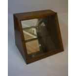 An Oak Shop Display Case, Having a glazed front, enclosing a glass shelve, 34cm high, 39cm wide,