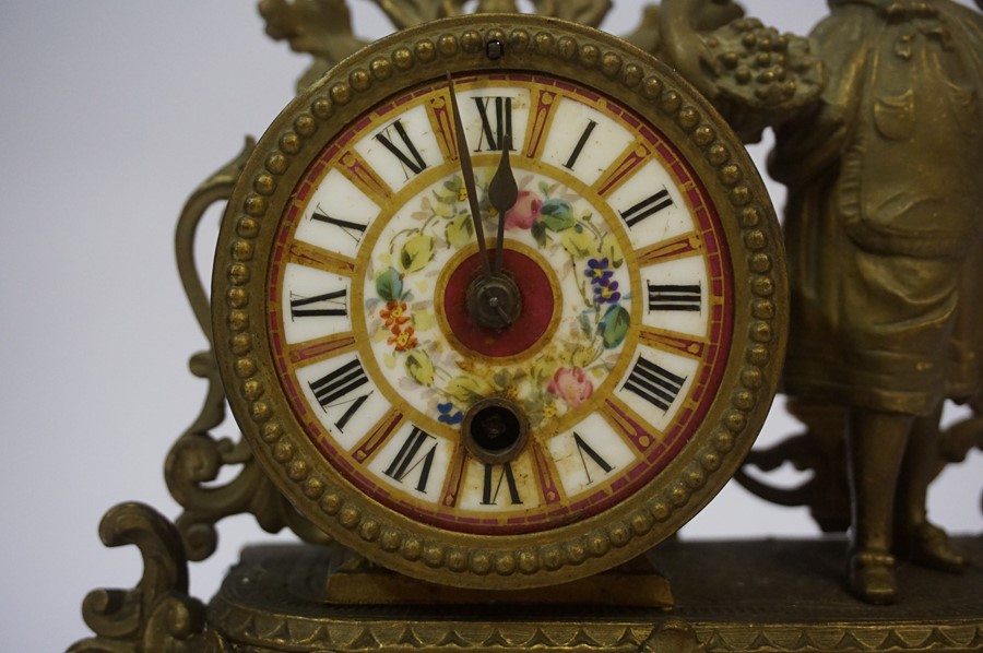 A French Gilt Metal Mantel Clock, circa late 19th century, Decorated with a standing maid next to - Image 3 of 5