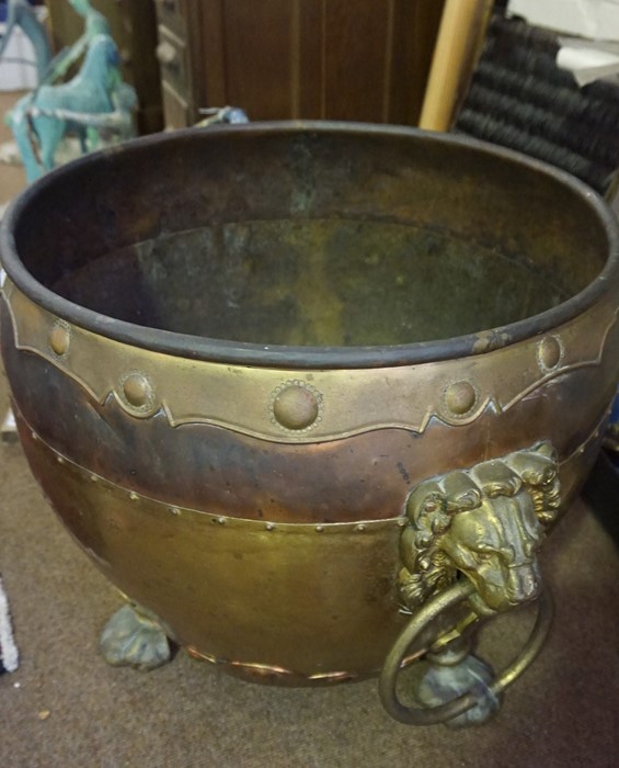 A Large Brass and Copper Jardiniere, circa late 19th century, Having lion mask ring handles,