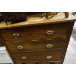 A Stained Wood Chest of Drawers, circa early 20th century, Having two small drawers, above two