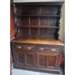An Oak Welsh Dresser, circa late 19th / early 20th century, The two tier dresser having open