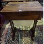 A Regency Design Rosewood Sewing Table, circa early 19th century, Having a swivel fold over top,