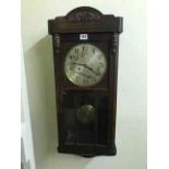 A Vintage Wall Clock, approximately 60cm high, also with an oak mantel clock, and another wall