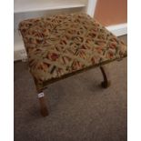 A Victorian Walnut X Form Stool, Having a needlepoint and velour top, raised on scroll supports,