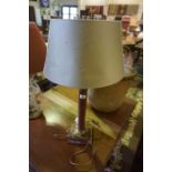 An Antique Style Column Lamp, Having gilt metal mounts, fitted for electricity, 54cm high, with