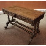 A Carved Oak Hall / Side Table, circa early 20th century, Having two drawers, decorated with