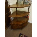 A Victorian Walnut Corner What Not, Having open tiers above four small drawers, raised on barley
