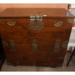An Antique Korean Chest, circa early 20th century, Having a hinged front, decorated with brass