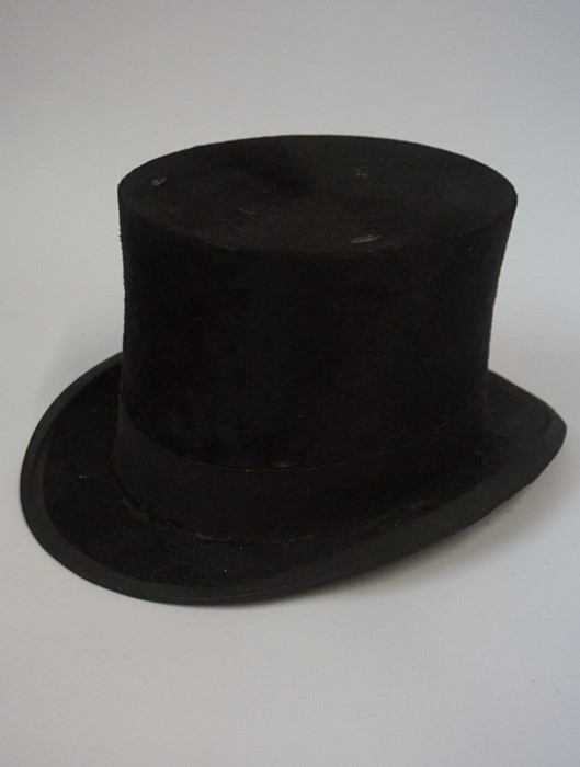 A Vintage Black Top Hat, Stamped to interior for Christy,s London, internal dimensions 19.5cm x