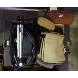 A Mixed Lot of Cameras and Binoculars, to include a Canon AE1 camera with accessories, and a pair of