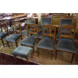 An Eight Piece Oak Parlour Suite, circa early 20th century, comprising of a gents armchair, ladies