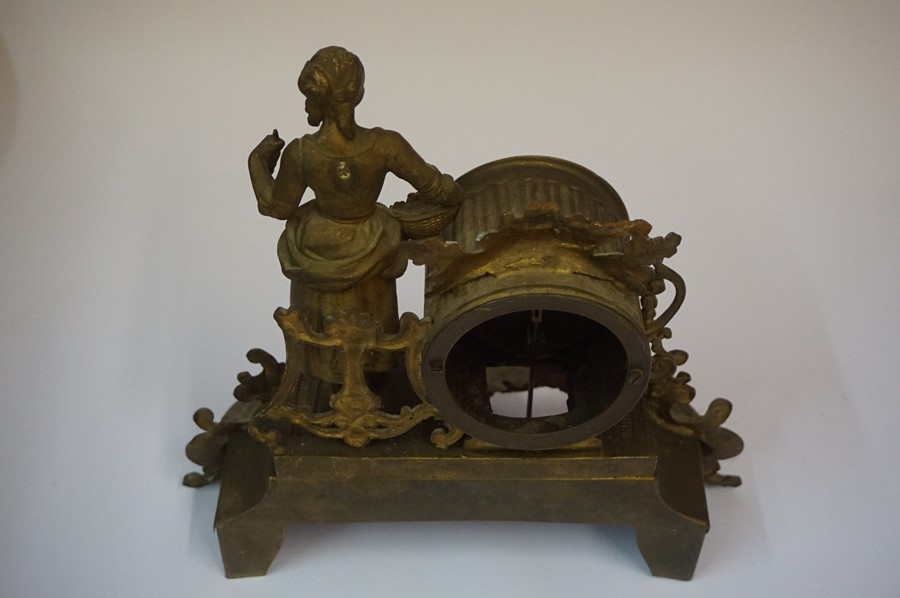 A French Gilt Metal Mantel Clock, circa late 19th century, Decorated with a standing maid next to - Image 5 of 5