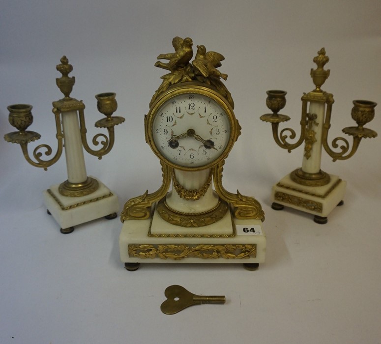 A French Gilt Metal and Marble Three Piece Clock Garniture, circa late 19th century, The drum head