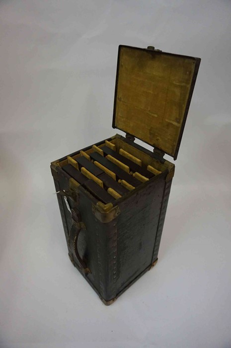 A Japanese Abacus, the four abucus are enclosed in a black lacquered and metal travel box