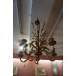 An Antique Italian Gilt Metal Ceiling Light, Having five candle sconces, 49cm high