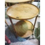 An Antique French Mahogany Two Tier Occasional Table, of circular form, 77cm high, 50cm wide