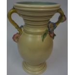 A Large Clarice Cliff for Newport Pottery Vase, Decorated with multi coloured moulded panels of