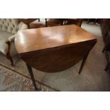 A Regency Mahogany Pembroke Table, circa early 19th century, Having drop ends, drawer to one side,