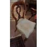 A Set of Four Victorian Walnut Parlour Chairs, Having sabre front legs, 88cm high, (4)