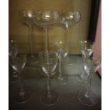 A Suite of Continental Enamel Decorated Glasses, to include decanter, champagne glasses, wine