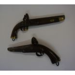 A Near Pair of French Flintlock Pistols, circa late 18th / early 19th century, Having brass mounts