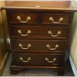 A Small Hardwood Chest of Drawers, Having two small drawers, above three long drawers, 68cm high,