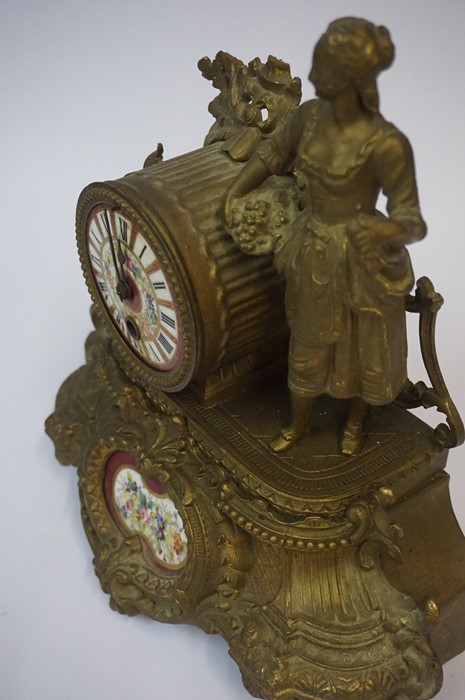 A French Gilt Metal Mantel Clock, circa late 19th century, Decorated with a standing maid next to - Image 4 of 5