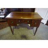 A Regency Design Mahogany Desk, circa early 19th century, Having a central drawer, flanked with a