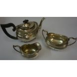 A Silver Three Piece Tea Service, Hallmarks for London, makers marks and date mark indistinct,