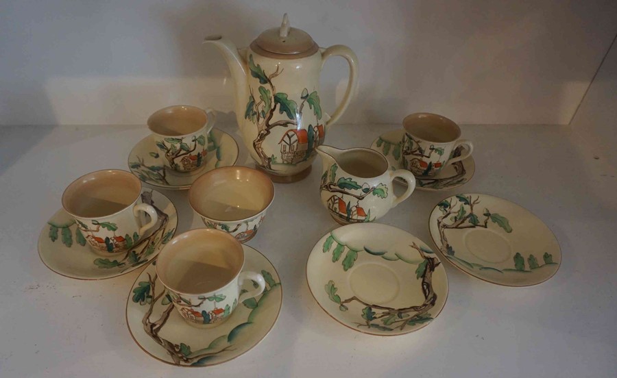 A Clarice Cliff "Tall Trees and Cottages" Pattern Coffee Set by Wilkinson, circa 1930s, Comprising