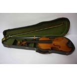 A Stradivarius Copy Violin, 59cm long, with a horse hair bow, in fitted case