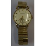 A Vintage 9ct Gold Gents Wristwatch by Wingartens Ltd of London, Having manual wind, baton markers