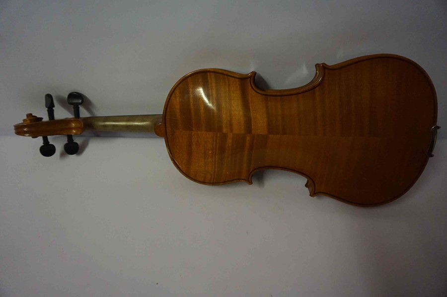 A Stradivarius Copy Violin, 59cm long, with a horse hair bow, in fitted case - Image 9 of 16