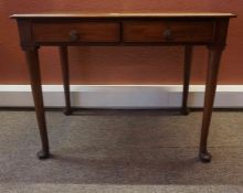 A Regency Design Mahogany Writing Table, circa mid 19th century, Having two small drawers, with