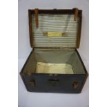 A Vintage Leather Bound Hat Box, 22cm high, 38cm wide