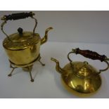 A Vintage Brass Toddy Kettle, Having an amber coloured glass handle, 22cm high, also with a brass