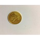 A Queen Elizabeth II 150 Dollar Gold Coin, to the obverse, for the commonwealth of the Bahamas