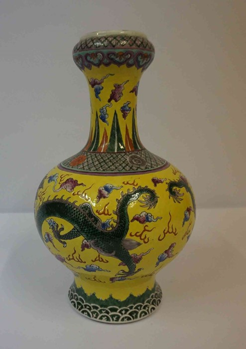 A Chinese Yellow Famille Rose Double Gourd Vase, Qing Dynasty (Tungchi period 1862) Decorated with