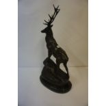 A Pair of Large Bronze Figures of Stags, "Monarch of the Glen" Raised on veined marble bases, 75cm