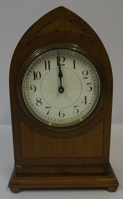 Edwardian Mahogany Lancet Shaped Mantel Clock, Having a white enamel dial with Arabic numerals,