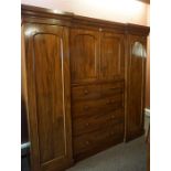 Victorian Mahogany Breakfront Wardrobe, Having two cupboard doors above two small drawers and