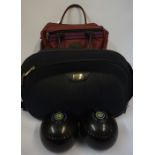 Two Sets of Four Bowling Balls, One set by Almark, in fitted carry bags, (8)