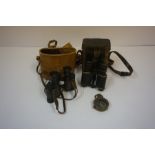 A Pair of WWI British Military Issue Binoculars, Having arrow stamp, 10cm high, with original